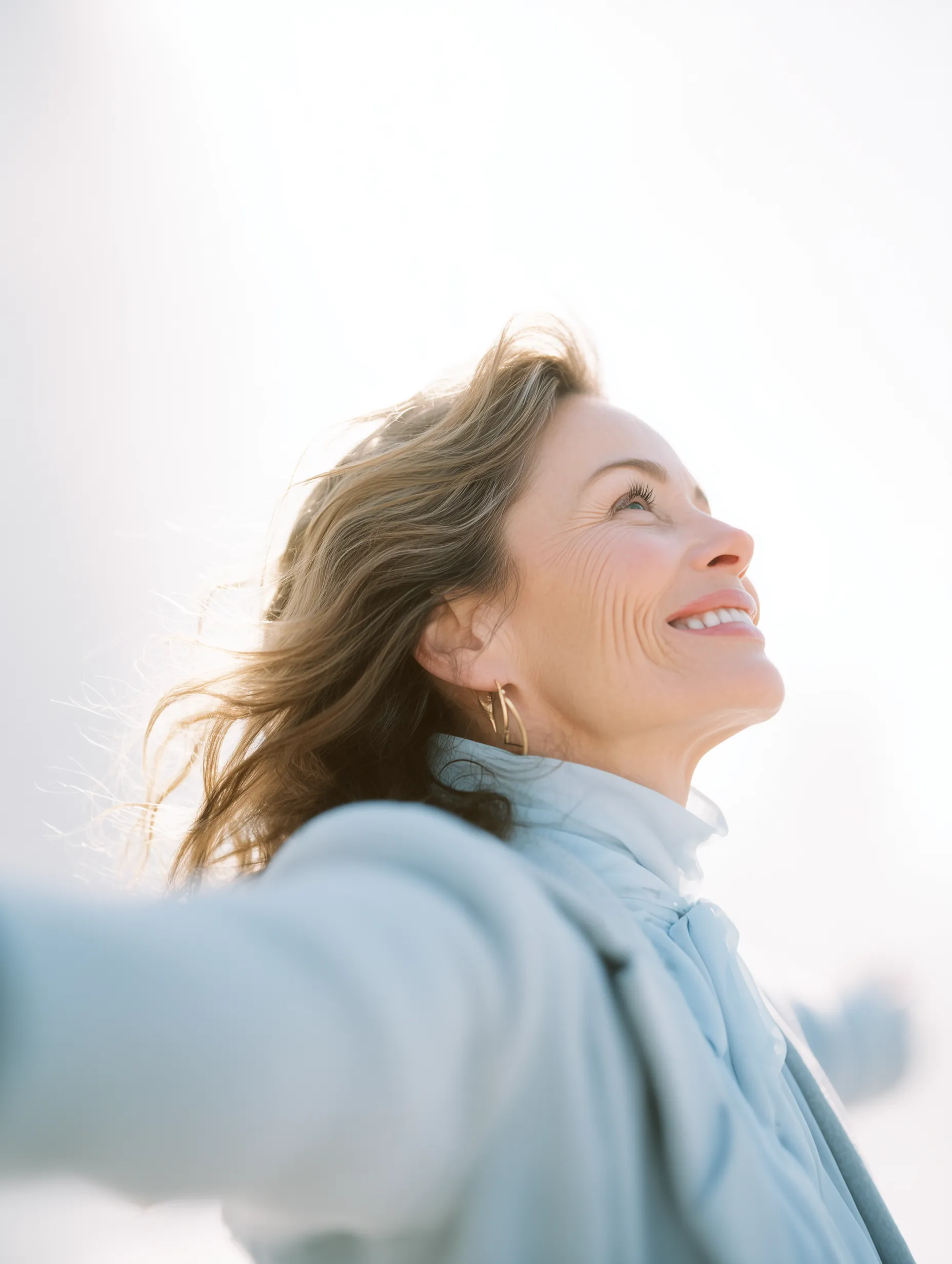 Woman embracing life and health after early detection